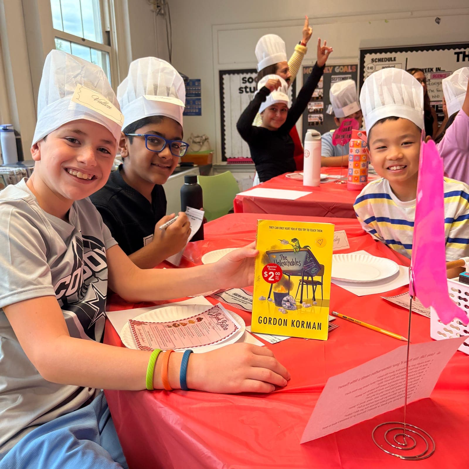 Central School fifth graders explore books during the Book Tasting event.